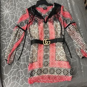 Bebe dress size XXS.  Runs slightly larger fit XS. DOES NOT INCLUDE GUCCI BELT!